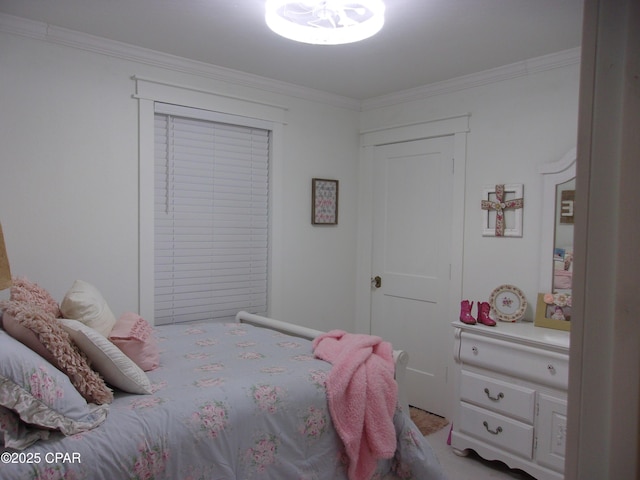 bedroom featuring crown molding