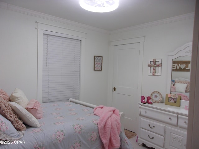 bedroom featuring crown molding