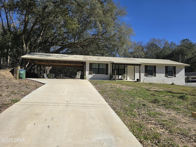 single story home with a carport