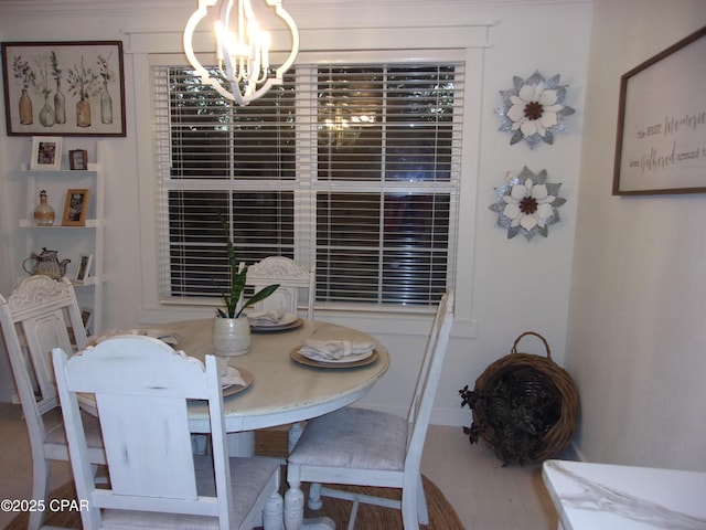 dining area with a notable chandelier