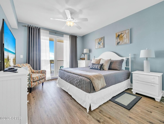 bedroom with ceiling fan, access to outside, and hardwood / wood-style flooring