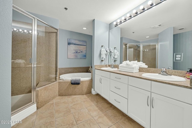 bathroom with separate shower and tub, tile patterned floors, and vanity