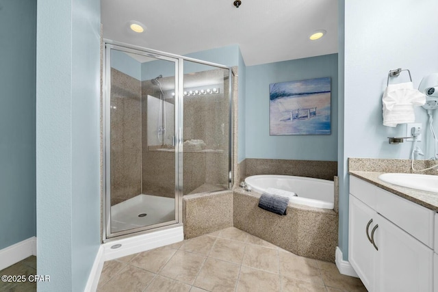 bathroom featuring vanity, tile patterned flooring, and independent shower and bath