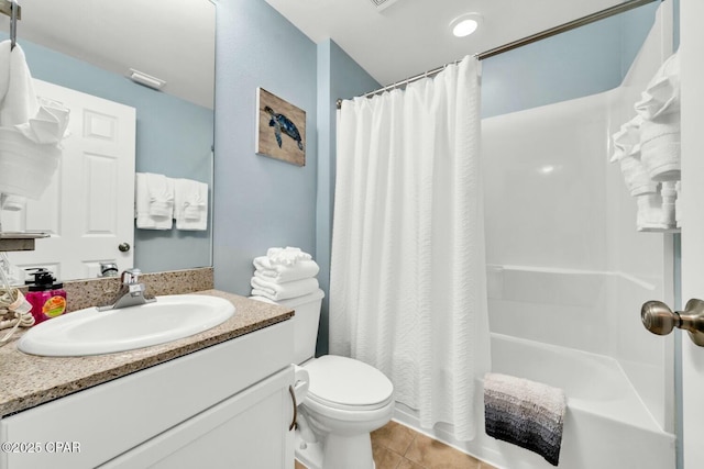 full bathroom with toilet, vanity, tile patterned floors, and shower / bath combo with shower curtain