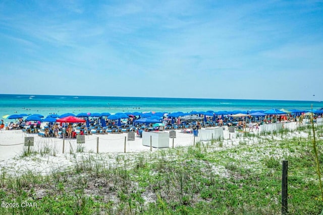 property view of water featuring a beach view