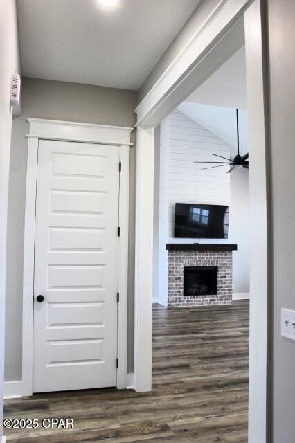 hall with dark hardwood / wood-style floors