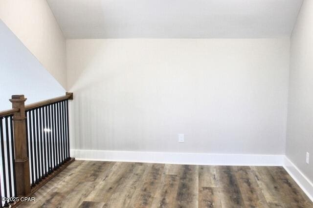 unfurnished room featuring hardwood / wood-style flooring