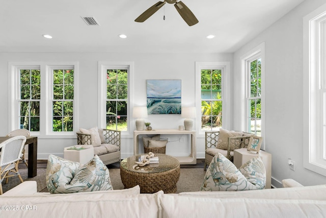 living room featuring ceiling fan