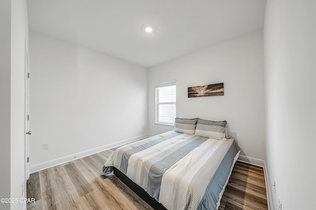 bedroom featuring hardwood / wood-style floors