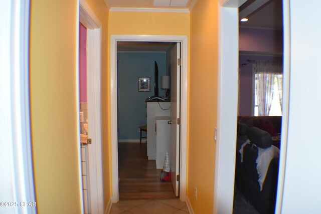 bedroom featuring crown molding, dark wood-type flooring, and ceiling fan