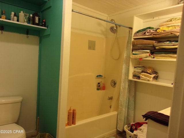 bathroom featuring toilet and shower / bathtub combination with curtain