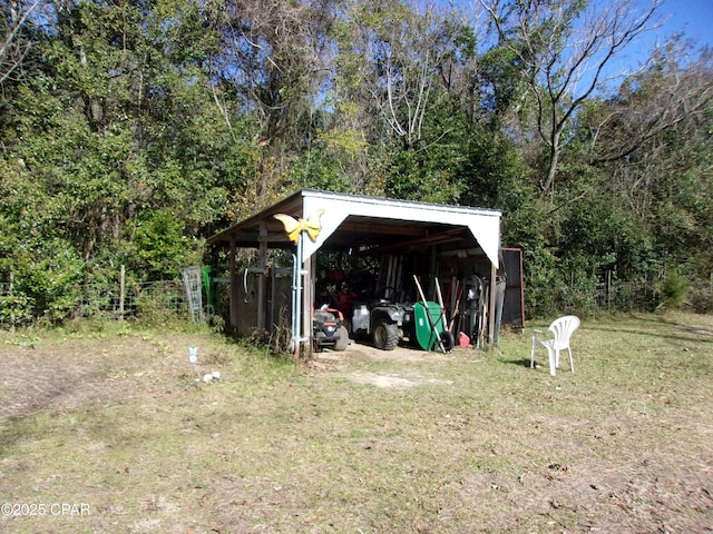 view of outdoor structure featuring a yard