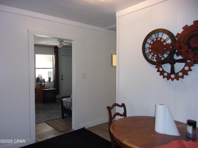 dining space with ceiling fan