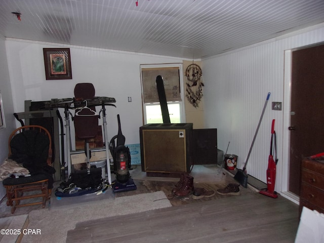 workout area with hardwood / wood-style floors