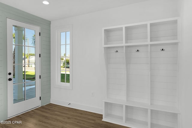 mudroom with dark hardwood / wood-style floors