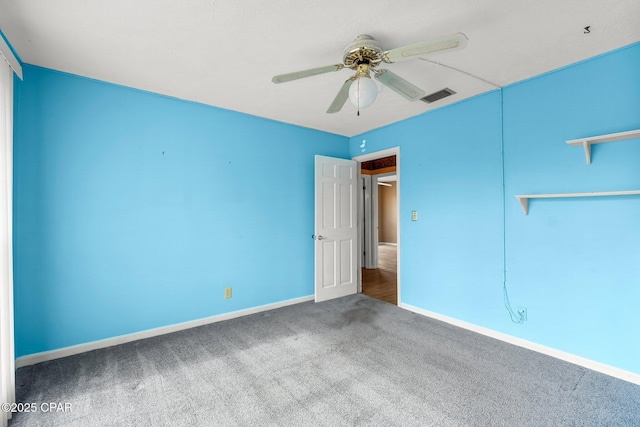 unfurnished bedroom featuring ceiling fan and carpet flooring