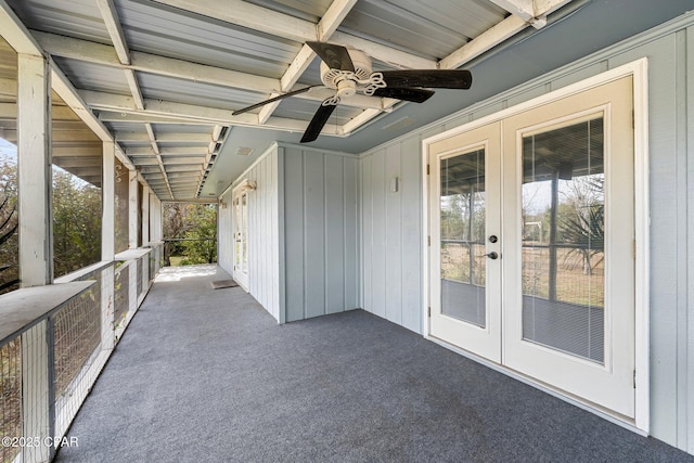 view of patio / terrace featuring ceiling fan and french doors