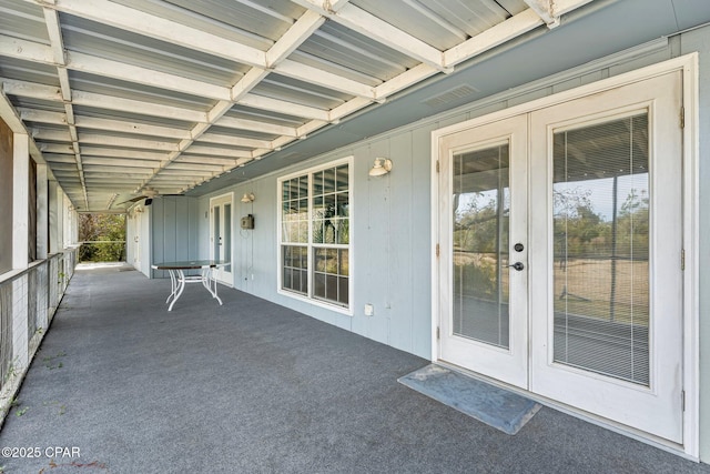 view of patio featuring french doors