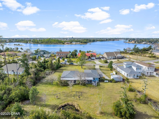 bird's eye view with a water view