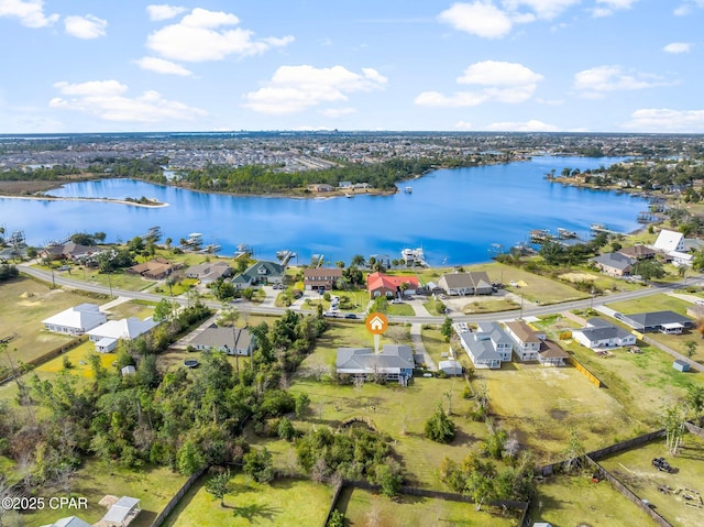 bird's eye view with a water view