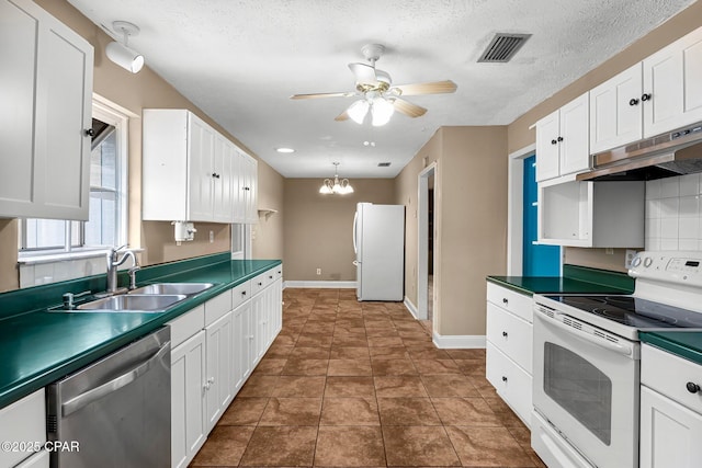 kitchen with white cabinets, ceiling fan with notable chandelier, sink, and white appliances