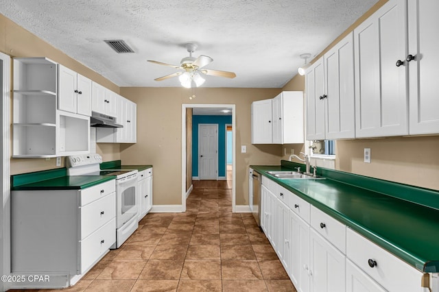 kitchen featuring ceiling fan, sink, white cabinetry, and white electric range oven