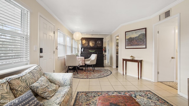 tiled living room featuring crown molding