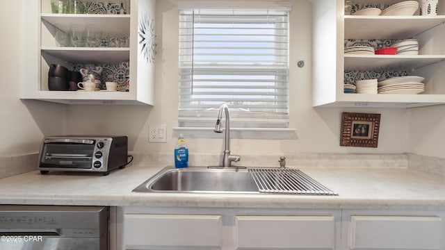 kitchen featuring dishwasher and sink