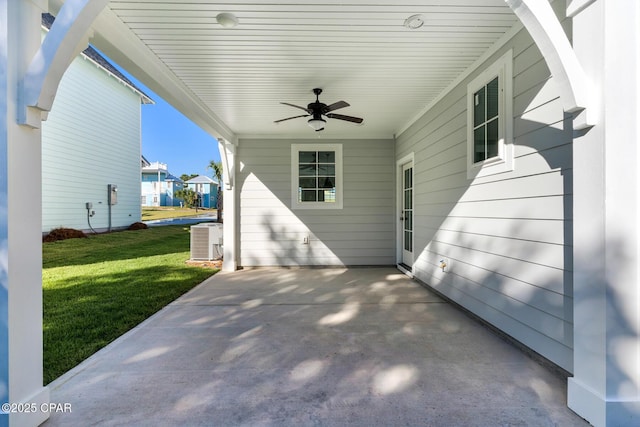 view of patio / terrace featuring ceiling fan and central AC unit