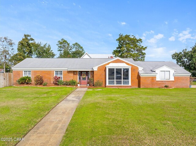 ranch-style house with a front lawn