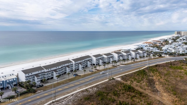 drone / aerial view with a view of the beach and a water view