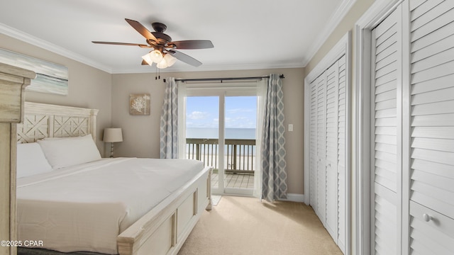 carpeted bedroom with a water view, ceiling fan, ornamental molding, and access to outside