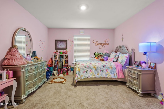 bedroom featuring carpet