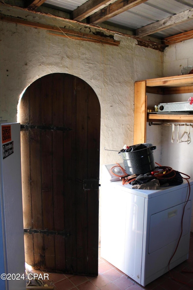 washroom featuring tile patterned floors and washer / clothes dryer