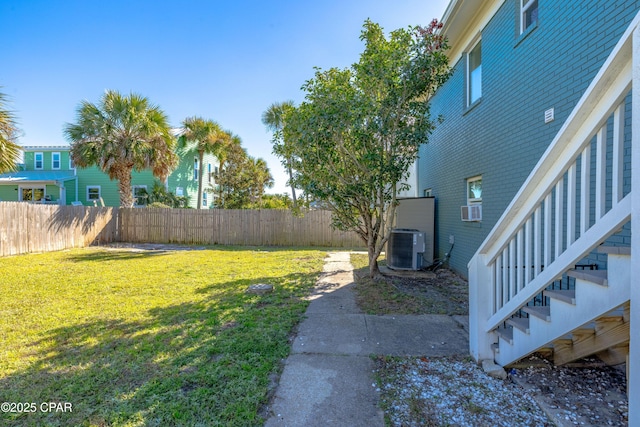 view of yard featuring central AC unit