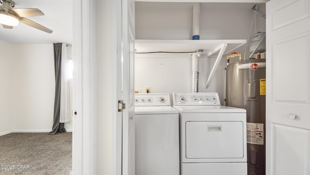 laundry area featuring ceiling fan, light colored carpet, electric water heater, and washing machine and clothes dryer