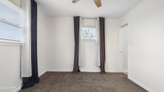 unfurnished bedroom featuring carpet flooring and ceiling fan