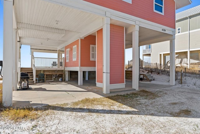 view of patio with grilling area and a carport