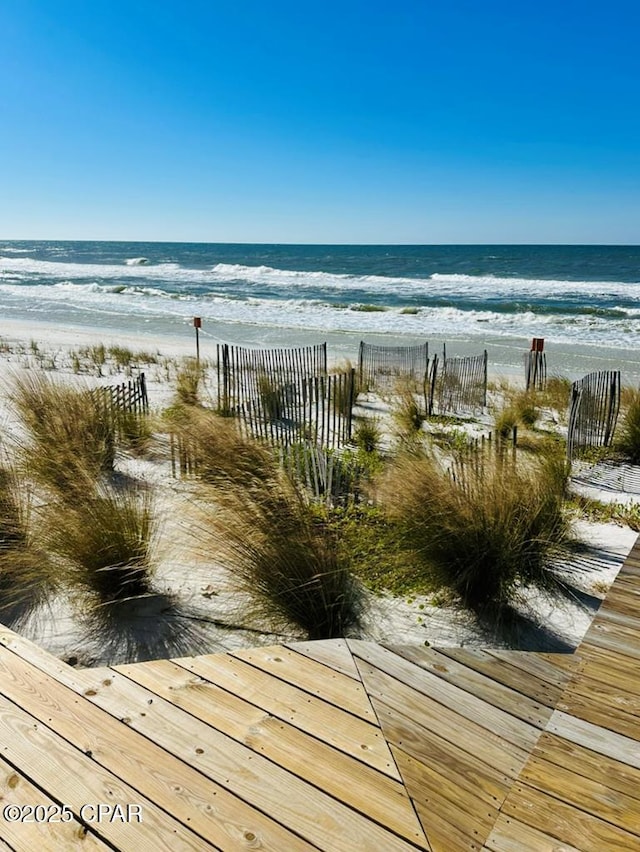 property view of water featuring a view of the beach