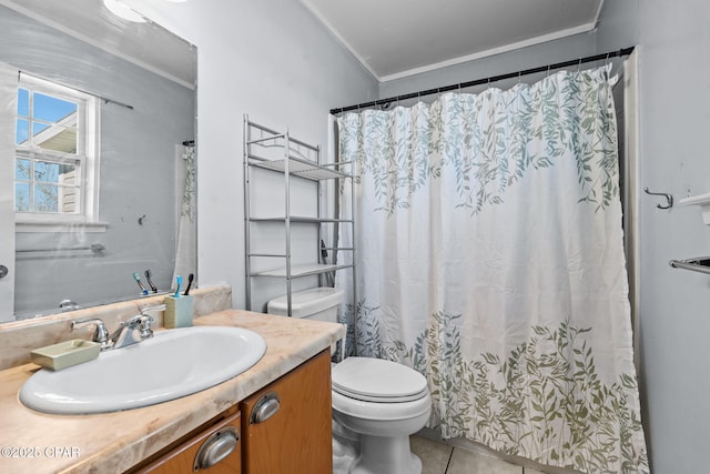 bathroom featuring tile patterned flooring, vanity, ornamental molding, and toilet