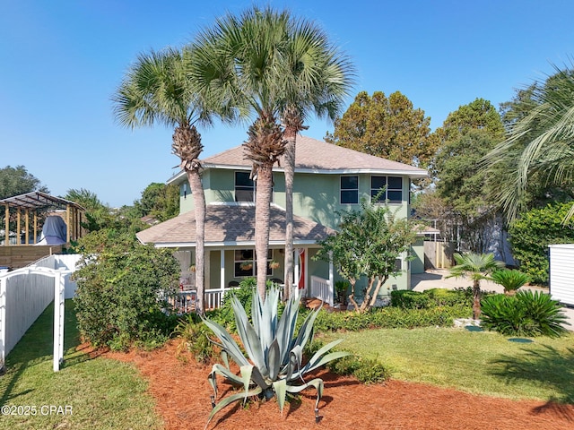 view of front facade with a front yard