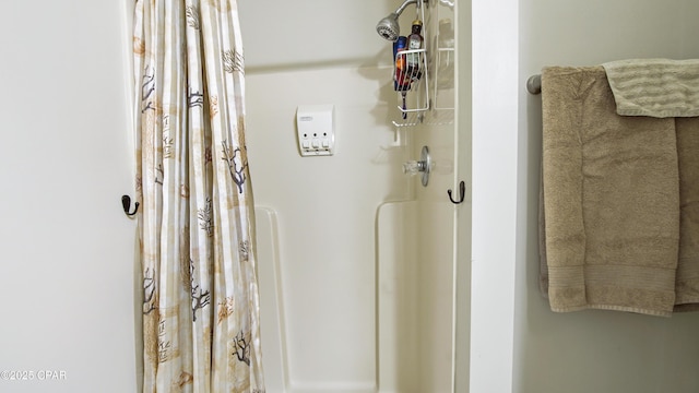 bathroom with curtained shower