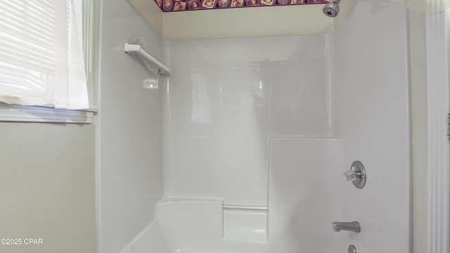 bathroom featuring  shower combination