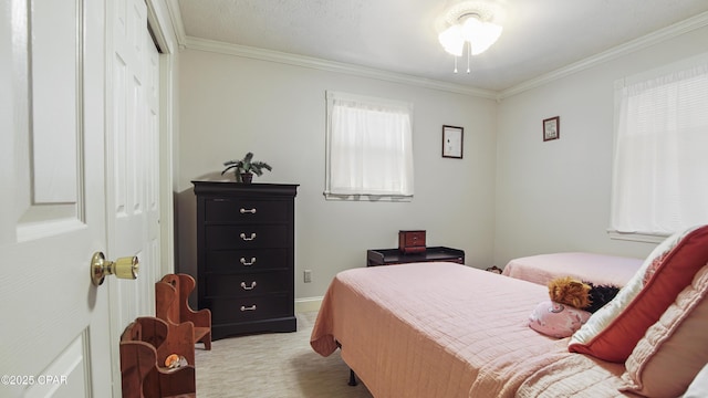 bedroom with a closet and ornamental molding