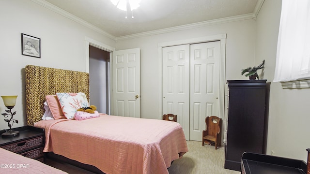 carpeted bedroom with a closet and crown molding