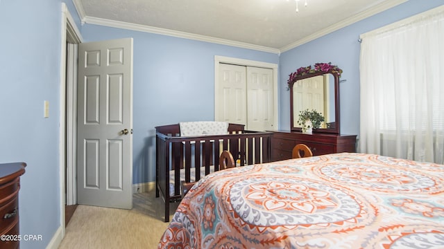 bedroom with a closet and crown molding