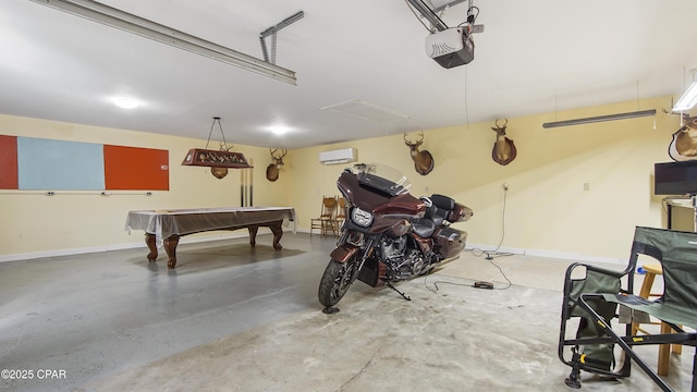 garage featuring an AC wall unit and a garage door opener