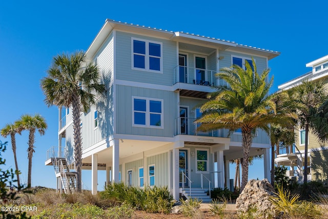 beach home featuring board and batten siding