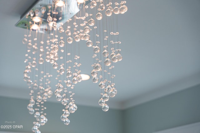 121 Gulf Hibiscus Dr, Port St Joe, FL 32456 - interior details with an inviting chandelier