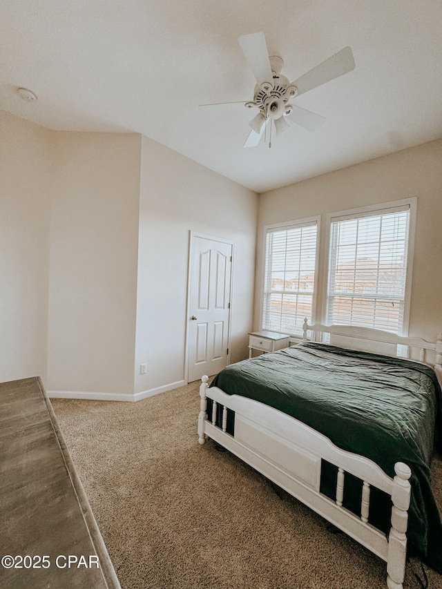 bedroom featuring ceiling fan and carpet flooring